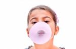 Portrait Of A Beautiful Little Girl Blowing Bubbles Stock Photo