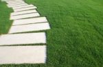 Serpentine Pathway Stones On A Park Lawn (concept) Stock Photo