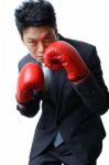 Businessman With Boxing Glove Ready To Fight With Work, Business Stock Photo