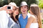 Group Of Students Standing Together Taking A Selfie Stock Photo