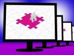 Unfinished Puzzle On Monitors Showing Completion Stock Photo
