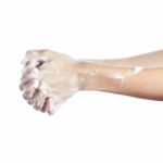 Woman Washes Her Hands. Pictured Female Hands In Soapsuds. Isola Stock Photo