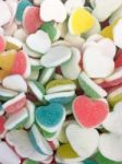 Colorful Heart Shape Jelly Candy Bonbon Snack Group. Sweet For Valentines Day Background. Pastel Color In Red Blue Green Yellow Pink Stock Photo