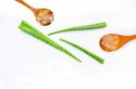 Aloe Vera Fresh Leaves With Aloe Vera Gel On Wooden Spoon Stock Photo