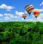 Colorful Hot Air Balloons Flying High Stock Photo
