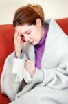Sick Woman With A Cup Of Tea Stock Photo