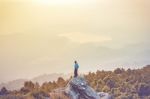 Instagram Filter Young Man Asia Tourist At Mountain Is Watching Over The Misty And Foggy Morning Sunrise, Travel Trekking Stock Photo