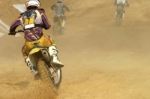 Motocross Bike Increase Speed In Track Stock Photo