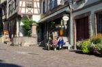 Old Women Enjoying The Sunshine In Riquewihr In Haut-rhin Alsace Stock Photo