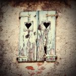 Wooden Window Shutters With Heart Shape Stock Photo