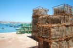 Old Fishing Cages In The Port Of Cascais, Portugal Stock Photo
