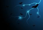 Halloween Bat Fly With Thunderbolt And Sky Stock Photo