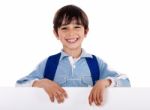 Smiling Young Boy Behind The Blank Board Stock Photo