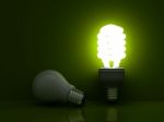 Glowing Energy Saving Light Bulb Stock Photo