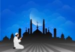Traditional Clothes Muslim Man Making A Supplication (salah) While Standing On A Praying Rug Against The Backdrop Of The Mosque. Illustration Stock Photo