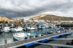 Boats Moored In Los Christianos Harbour Stock Photo