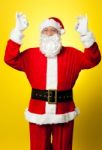 Aged Santa Gesturing Perfect Sign With Both Hands Stock Photo
