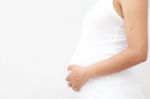 Pregnant Woman Caressing Her Belly Stock Photo