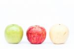 Three Different Kind Of Apples On White Background Stock Photo