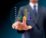 Graphs On The Hands Of Businessmen Stock Photo