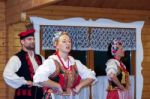 Group Of Singers And Dancers In Full Polish National Costume Stock Photo