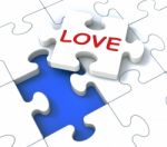 Love Puzzle Shows Loving Couples Stock Photo