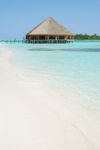 Bungalow's Architecture And Beach On A Maldivian Island Stock Photo