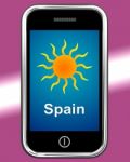 Spain On Phone Means Holidays And Sunny Weather Stock Photo