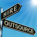Hire Or Outsource Directions Stock Photo