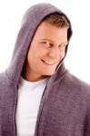 Smiling Man With Hood Coat Stock Photo