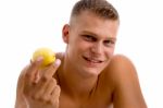 Muscular Male With Lemon Stock Photo