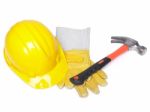 Hard Hat Hammer And Leather Gloves Stock Photo