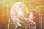 Women Hold Baby White Bengal Tiger Stock Photo