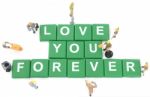 Miniature Worker Team Building Word Love You Forever On White Ba Stock Photo