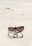 Starfish Standing With Sunglasses Stock Photo