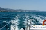 View From The Stern Of A Catamaran At Sea Stock Photo