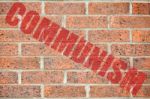 Old Brick Wall Texture With Communism Inscription Stock Photo