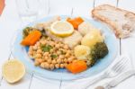 Codfish With Chickpeas And Vegetables Stock Photo