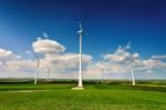 Eco Power. Wind Turbines Generating Electricity Stock Photo