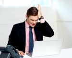 Unhappy Businessperson. Business Loss Stock Photo