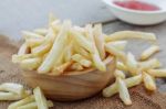 French Fries On Sackcloth Stock Photo