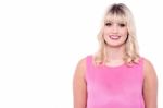 Pretty Woman In Pink Sleeveless Top Stock Photo