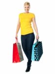 Girl Carrying Shopping Bags Stock Photo