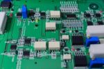 Electronic Circuit Board With Electronic Components Background Stock Photo