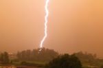 Vertical Lightning At Sunset Stock Photo