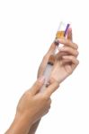 Syringe And Hand Stock Photo