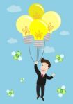 Businessman Float In The Air By Idea Light Bulb Balloon Stock Photo