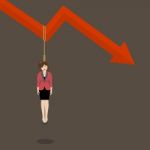 Business Woman Hang Herself On A Graph Down Stock Photo