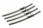 4 Japanese Swords And Green Textured Scabbard With Black Cord Isolated In White Background Stock Photo