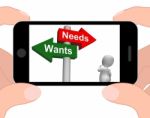 Wants Needs Signpost Displays Materialism Want Need Stock Photo